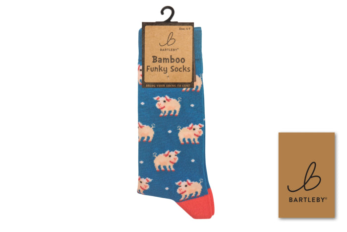 Blue socks with pink pig pattern and 'Bartleby' branding on a white background